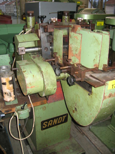SANDT Typ S37 automatic profile splitting machine for units soles with fixed knife, negative rotating mould, automatic sole feeding, machine gets rebuilt