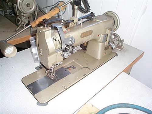 PFAFF Kl. 144-944/01 two needle flat bed sewing machine with drop feed, complete on table 