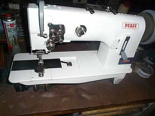PFAFF Kl. 246-706/05 two needle flat bed sewing machine with triple transport, complete on table with motor, general rebuilt