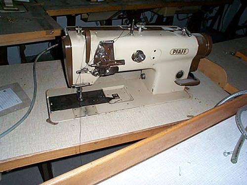 PFAFF Kl. 1445-706/05-900/56 single needle flat bed sewing machine with triple transport, large hooks, thread trimmer, foot lifter, complete on table with motor, general rebuilt