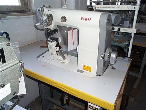 PFAFF Kl. 491-755/03-725/04 single needle flat post bed sewing machine with wheel feed, needle feed and driven roller presser, right standing post, complete with table and electronic motor with extra driven trimming device from below