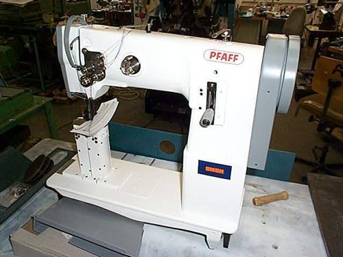 PFAFF Kl. 1294-944/01 two needle post bed sewing machine with drop feed , large rotary hooks, complete on table