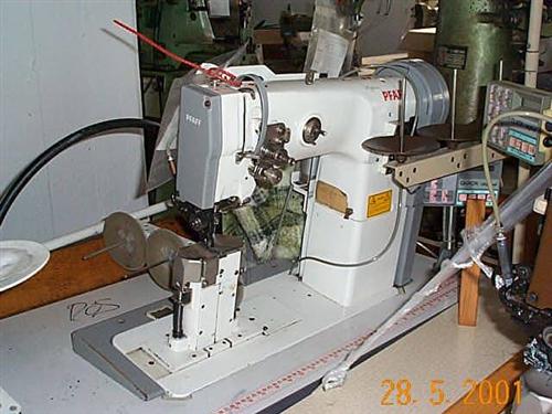 PFAFF Kl. 1294-750/01 two needle post bed sewing machine with drop feed, driven roller presser, large rotary hooks, complete on table