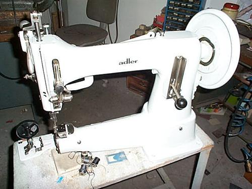 ADLER Kl. 105-25MO heavy duty arm typ sewing machine with barrel shuttle, drop feed, driven upper foot, complete on  table with motor