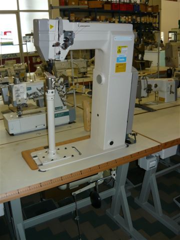 SIECK Kl. 691-420 BL single needle high post sewing machine with 420 mm post heigth right or left standing post with wheel feed, needle feed and driven roller presser, complete on table with 220 V adjustable speed electronic motor, brandnew
