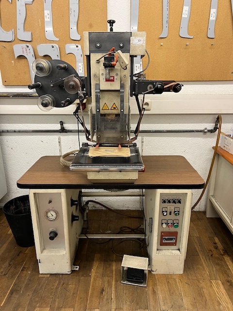 WSK type 205 embossing machine with stamping head 130 x 60 mm, automatic sliding table, foil device programmable, 10 kN pressure, year 1993